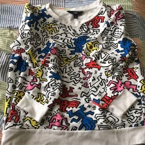 White long-sleeve with cute design on